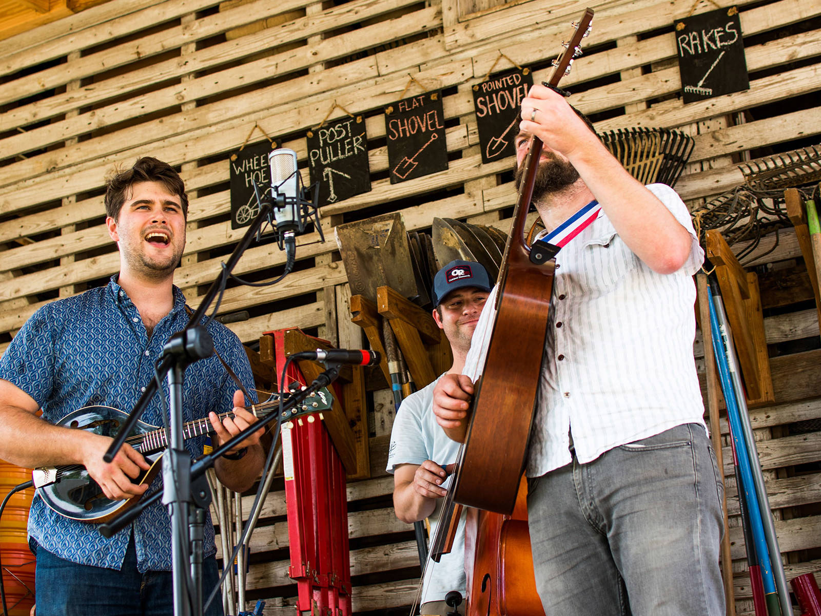 Shalom Farms | Musicians singing at farm event